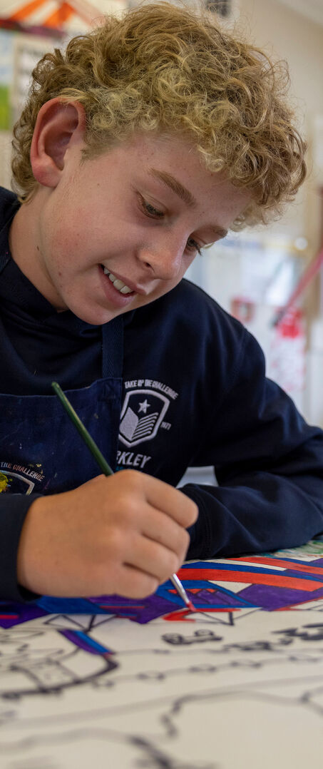 Starting at Berkley Student Paints a Colourful Geometric Artwork in Class
